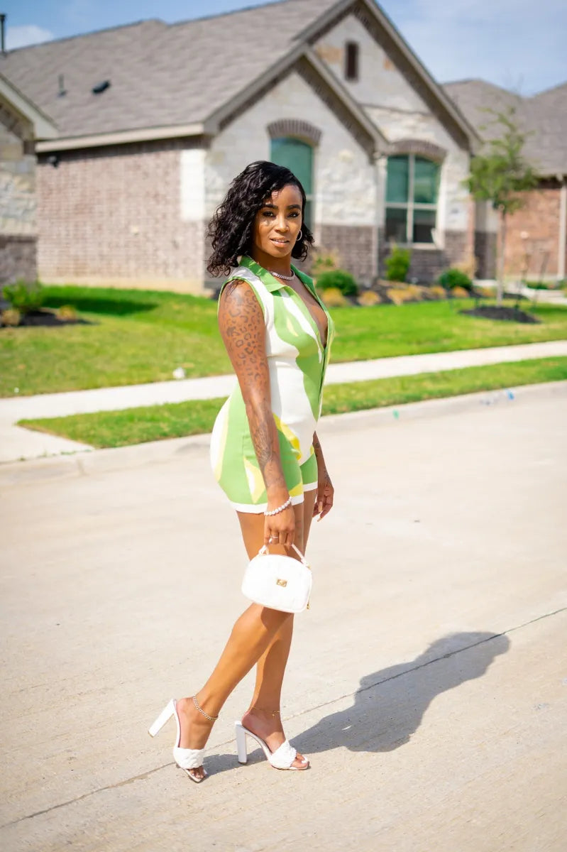 girl wearing Green Light Playsuit